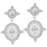 Oval white Moissanite sterling silver earrings with accent, featuring elegant design and sparkling gemstones.